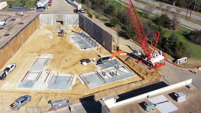 Hooking a Crane to a Concrete Slab, Bryan, Texas, USA
