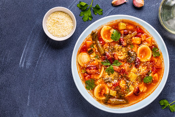 Minestrone, italian vegetable soup with pasta and beans.