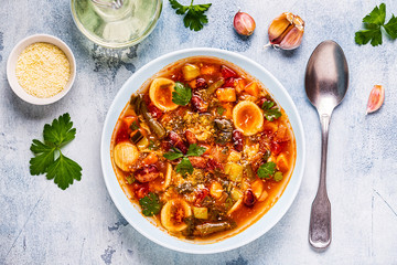 Minestrone, italian vegetable soup with pasta and beans.
