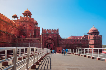 People entering famous Red Fort of Delhi on a sunny summer day in the capital city of India....