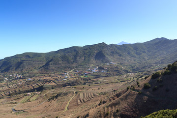 Village panorama with volcano Mount Teide in the background on Canary Island Tenerife, Spain