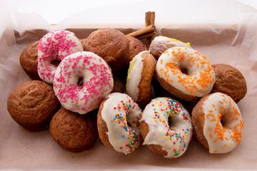 Apple Cinnamon Muffins and donuts with apples and cinnamon sticks