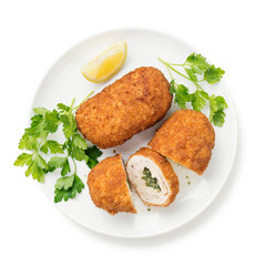 Breaded Chicken Kiev breast stuffed with butter, garlic and herbs. isolated on white background	
