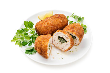 Breaded Chicken Kiev breast stuffed with butter, garlic and herbs. isolated on white background	
