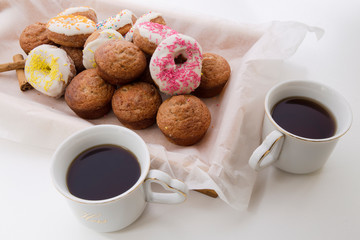 Apple Cinnamon Muffins and donuts with apples and cinnamon sticks