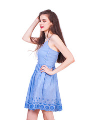 Fashion portrait of a young beautiful woman in dress