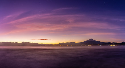 Naklejka na ściany i meble Nautical twilight, shortly before dawn on Villarrica lake 