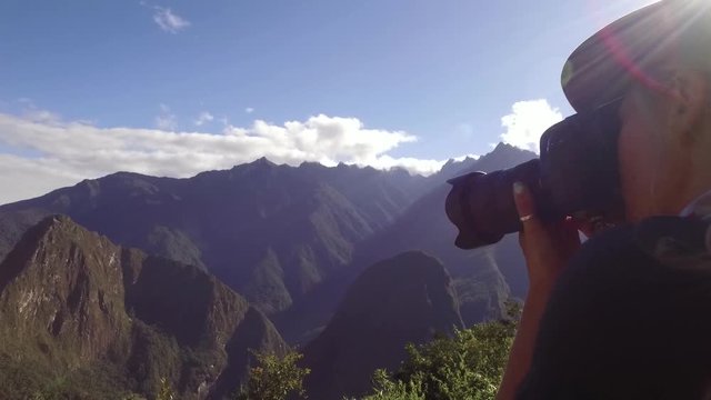 Hiker taking photo on Inca trail to Machu Picchu, Cusco, Peru
