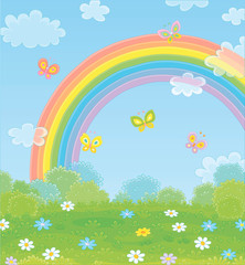 Colorful rainbow in the blue sky and cheerful butterflies flittering over a green field with beautiful flowers on a pretty summer day after warm rain, vector cartoon illustration