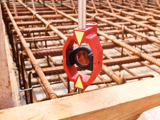 mini prism during geodetic survey works on construction site