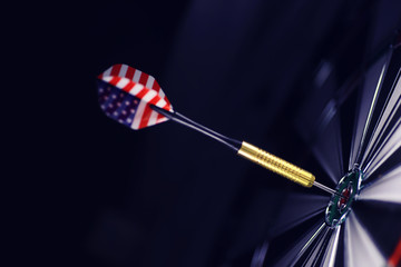 Darts. The dart for playing in the game board is stuck. Hit sector in darts. The concept of a successful strategy.