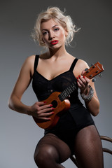 Young Woman With Ukulele