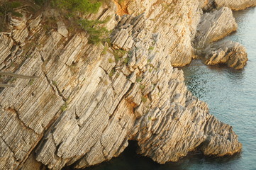 interesting texture of the rock by the sea