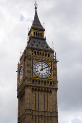 Fototapeta na wymiar London, United Kingdom 9-8-2017 - Isolated photo of big ben clock tower in London. Tourist attraction photo, cloudy and rainy weather