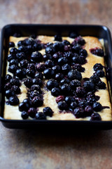 Homemade Blueberries Cake. Rustic stone background. Close up.	