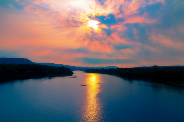Fototapeta na wymiar The beautiful nature at sunrise of the Mun River, Ubon Ratchathani Province, Thailand