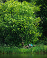 man and woman in the forest another lake