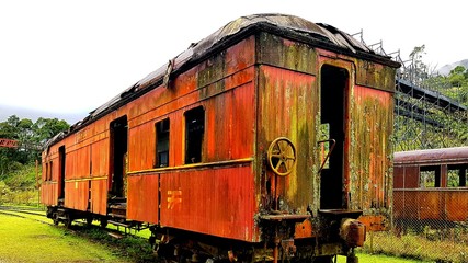 Obraz na płótnie Canvas Abandoned Train Against Sky