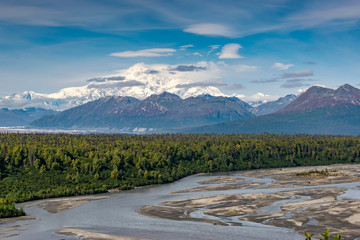 Alaskan landscape with river, forest and Mount Denali