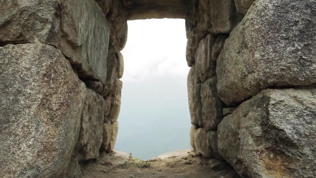 Traveling. window in stone wall. Machu Picchu, Cusco, Peru