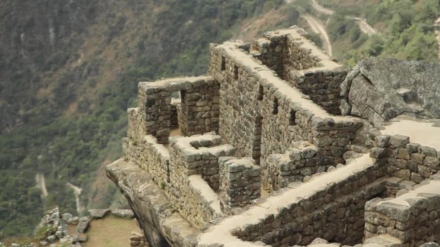 Stone temple and birds in Machu Picchu, Cusco, Peru