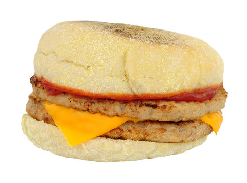 Sausage Burger And Cheese Sandwich In An English Muffin Isolated On A White Background