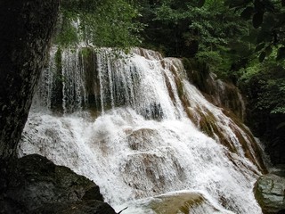 beautiful waterfall flows in cascades, nature of Thailand