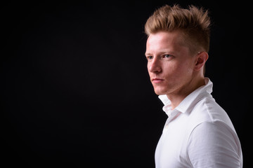 Face of rebellious man as punk rocker