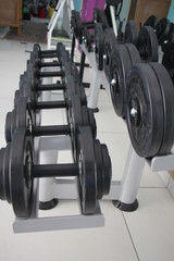 Fototapeta na wymiar gym with fitness equipment
