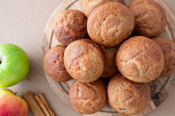Apple Cinnamon Muffins with apples and cinnamon sticks