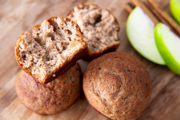 Apple Cinnamon Muffins with apples and cinnamon sticks