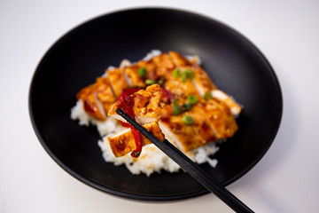 Rice covered by Teriyaki Chicken