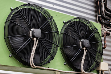 Large air conditioning on wall of building