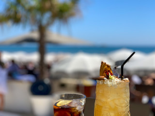Cool cocktails at a beautiful beach in Ibiza Spain