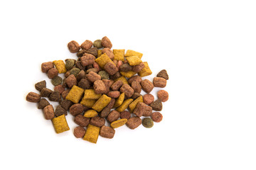 Heap of colorful dry cat food on a white background