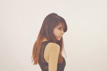 Obraz premium Profile portrait of a young model with brown hair