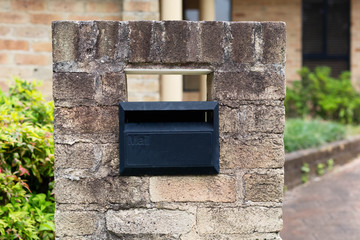  mailbox no number in front of the house with sunlight and beautiful natural background