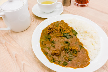 Japanese boiled beef curry with rice and Japanese green tea.