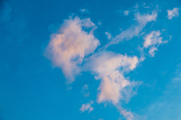 colored clouds in a blue sky