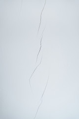 Light wall with a crack. Background