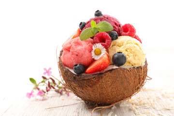 ice cream scoop in coconut bowl