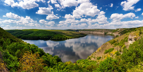 Obraz premium Beautiful view over the river on a sunny day. Outdoor recreation. Dniester Grand Canyon.