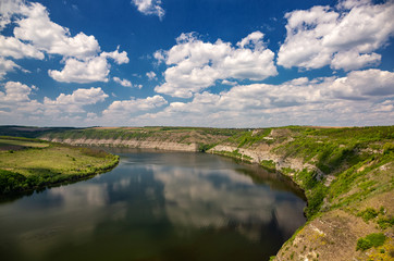 Beautiful view over the river on a sunny day. Outdoor recreation. Dniester Grand Canyon.