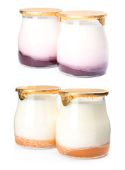 Set of delicious natural yogurts in jars on white background