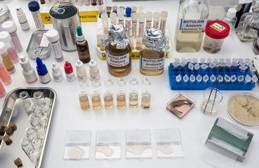 Samples contaminated by Clostridium botulinum toxin that causes botulism in humans, laboratory research, conceptual image