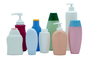 Set of various shampoo, conditioner, lotion plastic bottles on a white background.
