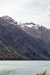 Beautiful lakes of the South Island. Lake Gunn and the snowy peaks above it. New Zealand