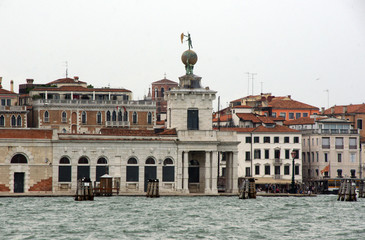 Fototapeta na wymiar Cityscape with historical facades in Venice. View from the adriatic sea