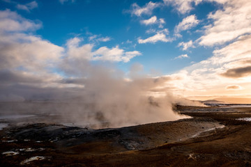 Fototapeta na wymiar A huge chimney giving off water vapor in Hverir, Iceland