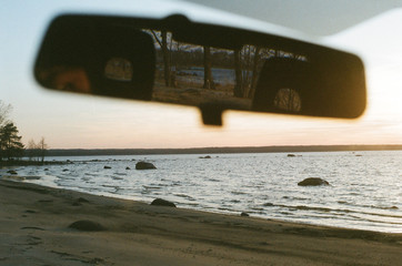 mirror in a car and sea